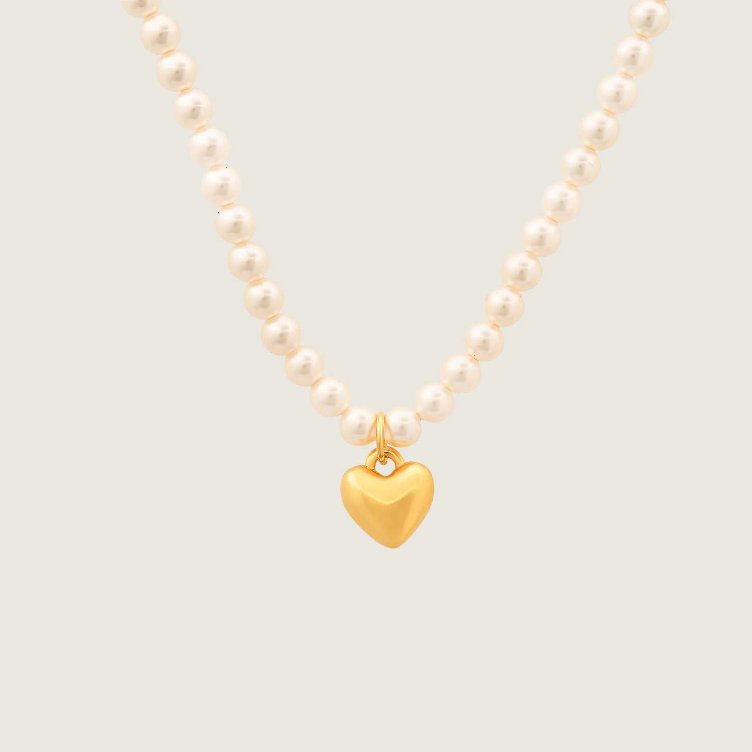 Pearl Strand Necklace with Puffed Heart Pendant